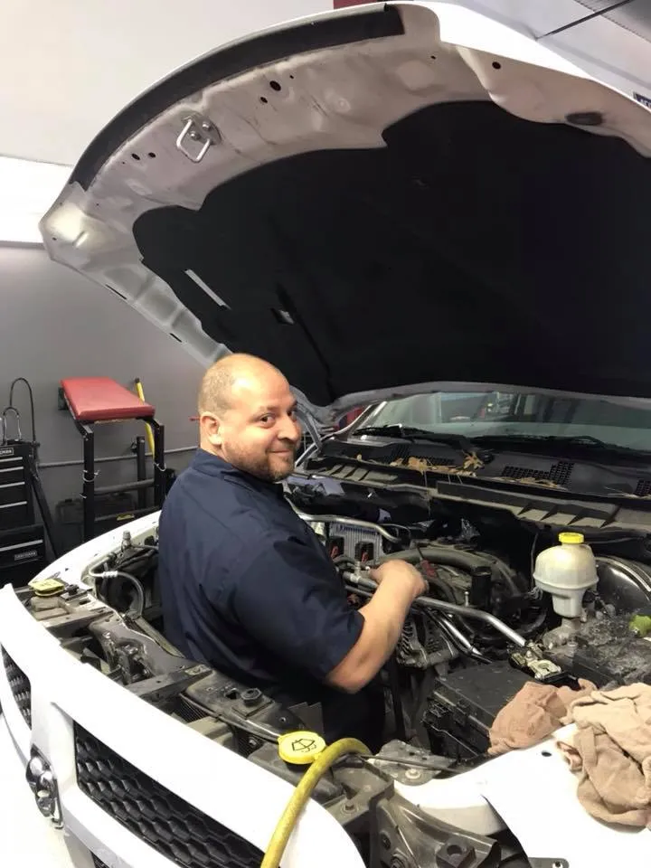 Alex working on an engine